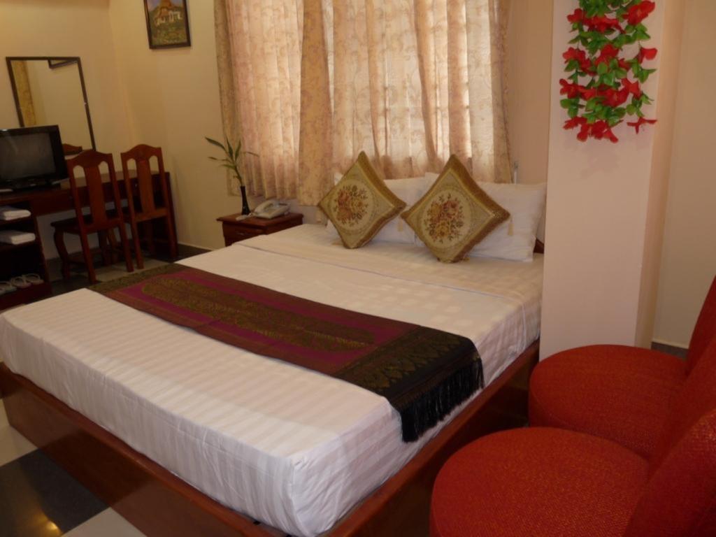 Hi Land Hotel Phnom Penh Habitación foto